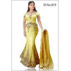 Manufacturers Exporters and Wholesale Suppliers of Lovely Yellow Lehenga Choli Mumbai Maharashtra